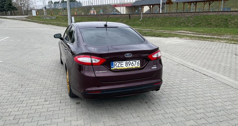 Ford Fusion cena 33500 przebieg: 229840, rok produkcji 2013 z Koluszki małe 326